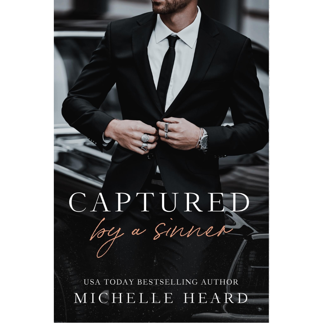 Captured by a Sinner by Michelle Heard